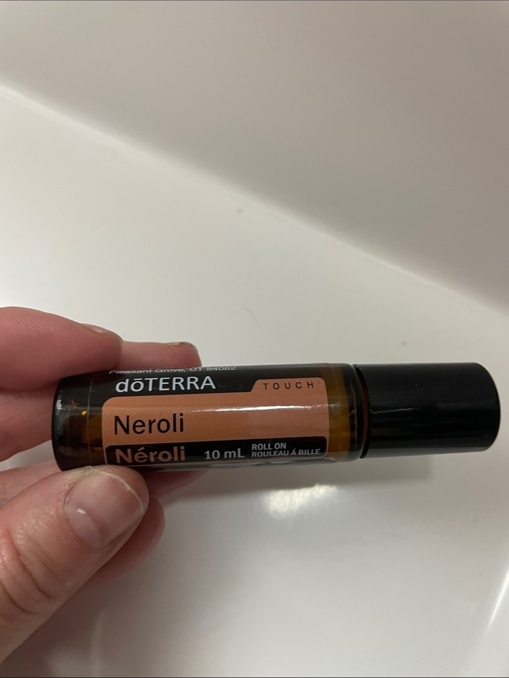 Doterra Neroli Touch Roll-On with Peach Label and Black Cap